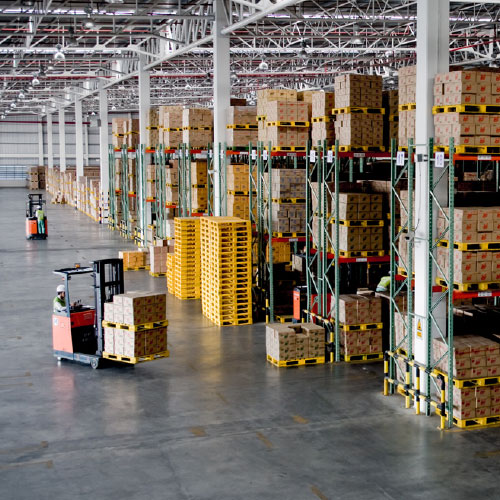 Warehouse with forklifts